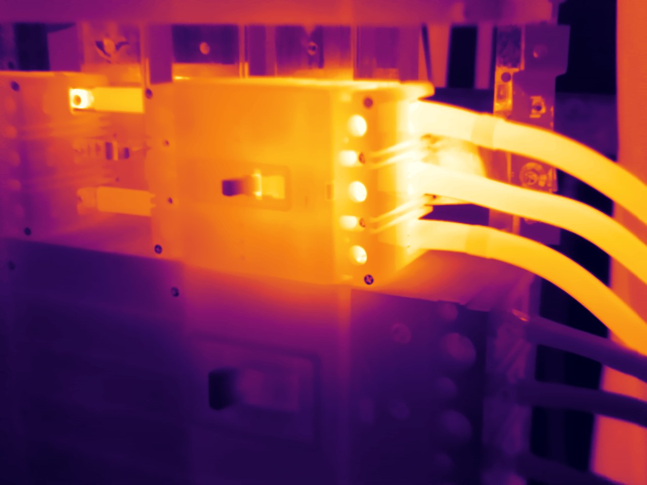 Main breaker — load-side lugs at 73 °C